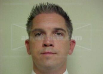 Thomas M Kuhns