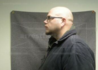 Aaron J Schrauth