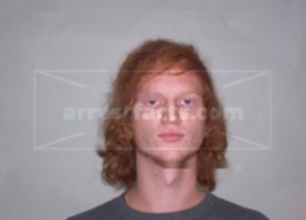 Justin L Kuhn