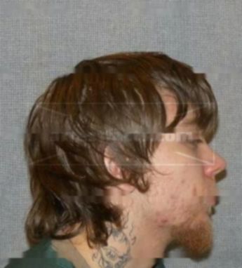 Adam M Slawinski