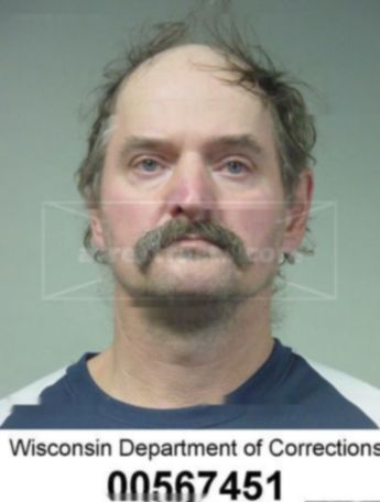Timothy L Buss