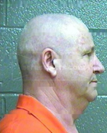 Clarence L Madill