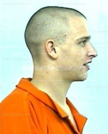 Travis J Merritt