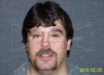 Travis J Gurney
