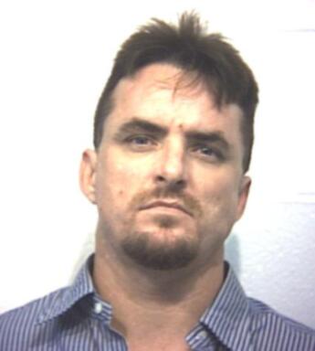 Troy Newman Cross