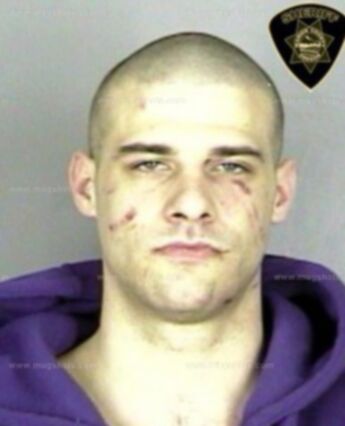 Travis J Hensley