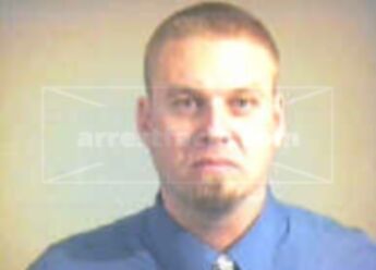 Dustin J Brewer