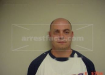 Justin L Huenefeld