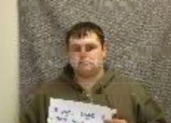 Travis J Bluem