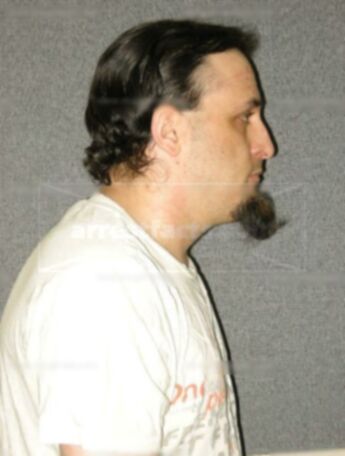 Travis J Duckett