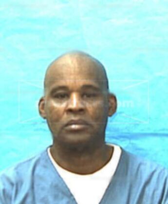 Derrick J Laws