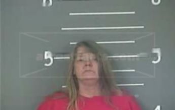 Lora J Miller