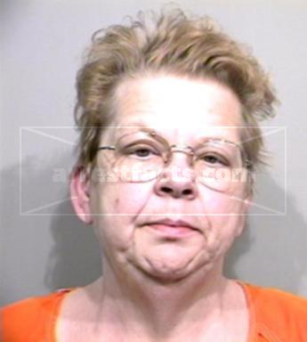 Beverly E Barker