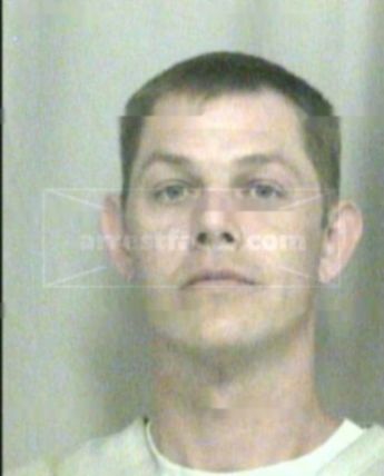 Adam K Dennis