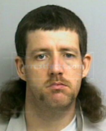 Justin H Trammel