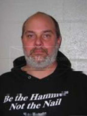 Joel C Schrader