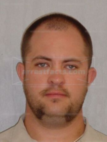 Travis J Sturm