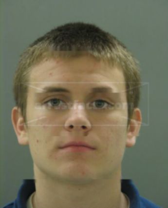 Tyler M Szymanski