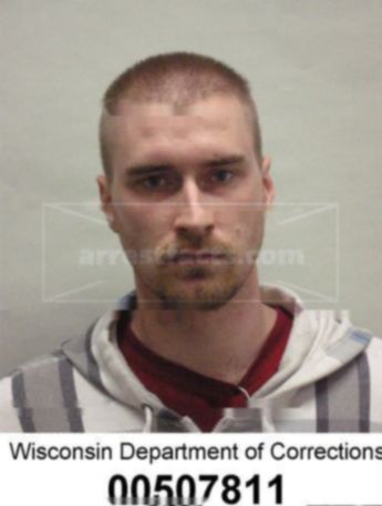 Justin T Olszewski