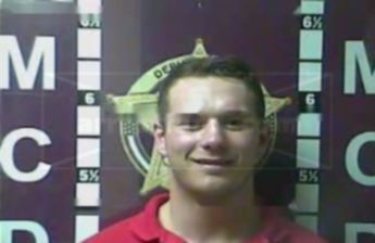 Travis L Adams