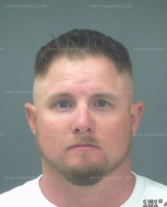 Travis Reed Holcomb