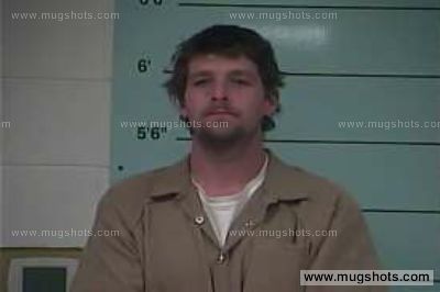 Travis A Rhoades