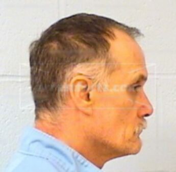 Lawrence S Tuttle