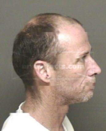Wilfred L Schneider