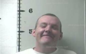 Travis E. Walls