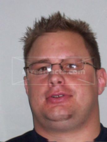 Elliott T Schider