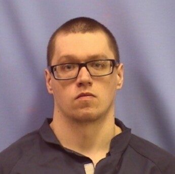 Travis E. Crain