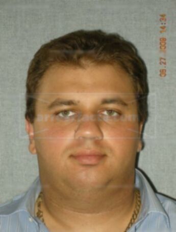 Nicholas T Minassi