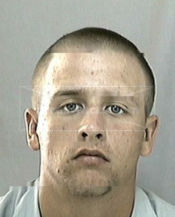 Travis J Merritt