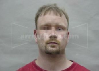 Travis L Martin