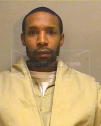 Dennison K Moore