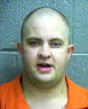 Travis J Sturm
