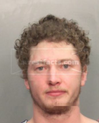 Justin M Connolly
