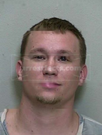 Kyle M Scroggins