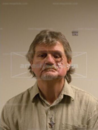 Timothy J Ellison