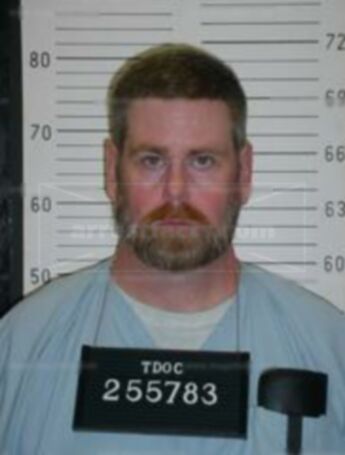 Thomas D Huskey