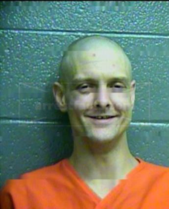 Travis J Whitener
