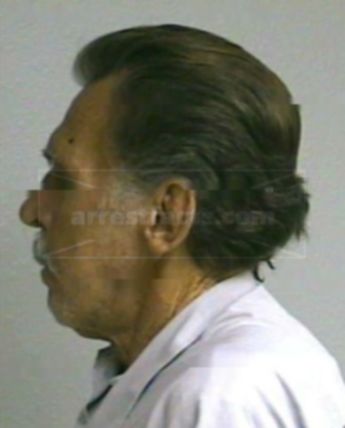 Cecil E Woods