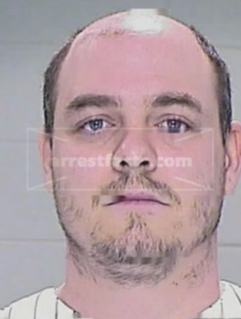 Justin L Huenefeld