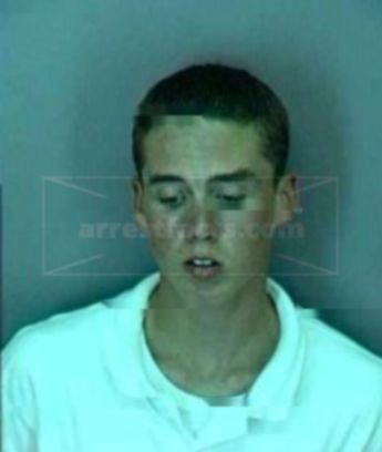 Travis J Blythe