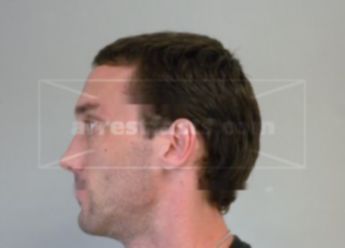 Travis J Wolfe