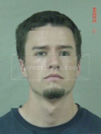 Travis J Korff