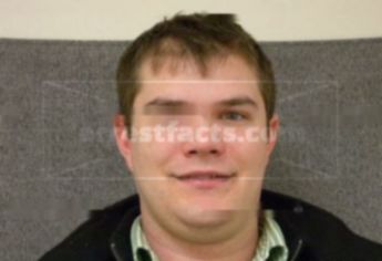 Travis J Benson