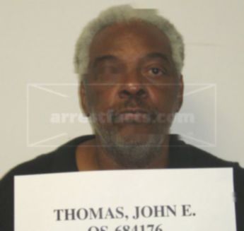 John E Thomas