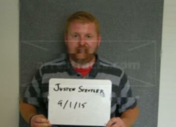 Justin S Stettler