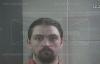 Justin M Combs